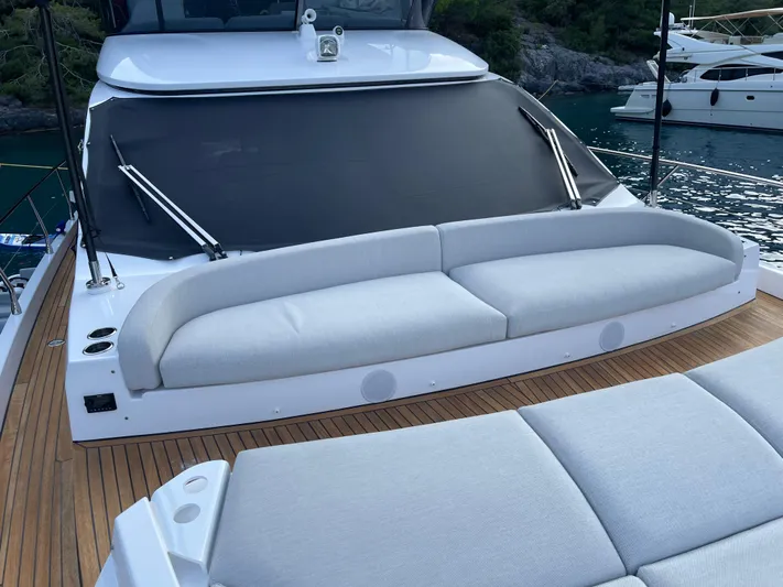  Yacht Photos Pics 2023 Azimut Fly 53 yacht deck with luxurious seating and sleek design.