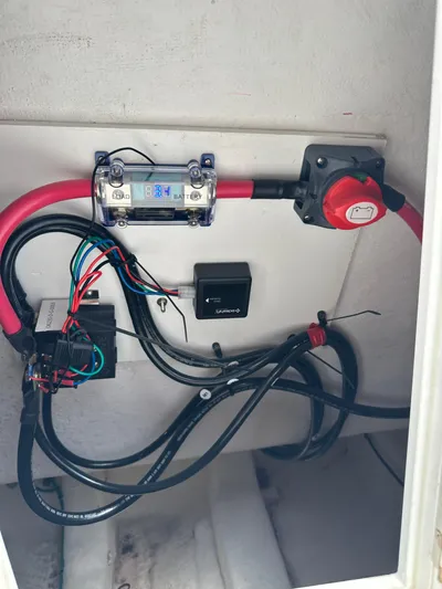  Yacht Photos Pics Electrical wiring setup in a 2018 True North 34OE boat, featuring cables and switches.