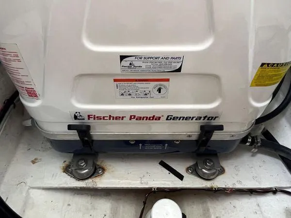  Yacht Photos Pics Fischer Panda generator in a 2018 True North 34OE boat, secured and labeled.