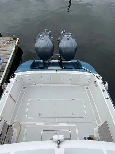  Yacht Photos Pics 2018 True North 34OE boat with dual outboard motors docked at marina.