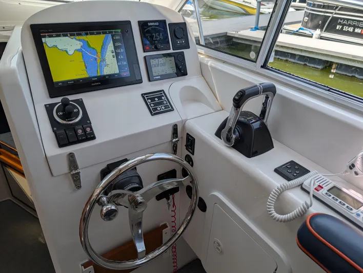 Yacht Photos Pics Helm of 2018 True North 34OE boat with navigation and control systems.
