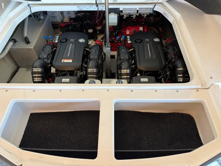 Social Distance Yacht Photos Pics Engine compartment of a 2019 Regal 35 Sport Coupe with dual engines.
