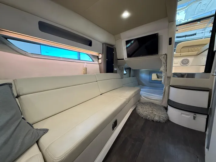 Social Distance Yacht Photos Pics Luxurious interior of 2019 Regal 35 Sport Coupe with plush seating and modern amenities.