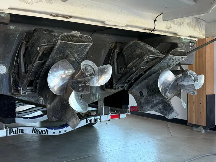 Social Distance Yacht Photos Pics 2019 Regal 35 Sport Coupe boat propellers on a trailer, close-up view.