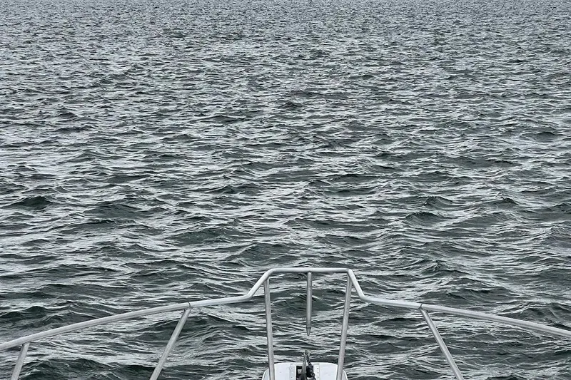 Our Trade II Yacht Photos Pics Bow of 1996 Ocean Yachts 48 Super Sport on open sea.