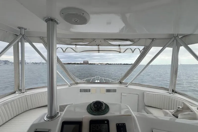 Our Trade II Yacht Photos Pics 1996 Ocean Yachts 48 Super Sport yacht interior with ocean view through windows.