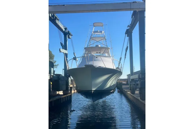 Our Trade II Yacht Photos Pics 1996 Ocean Yachts 48 Super Sport in dry dock, front view.