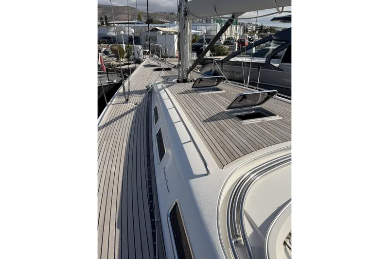 Heartbreaker Yacht Photos Pics 2011 X-Yachts X-55 sailboat deck with open hatches, docked in marina.