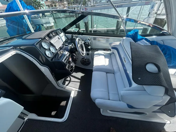  Yacht Photos Pics 2017 Formula 350 Crossover Bowrider interior with helm, seating, and dashboard controls.
