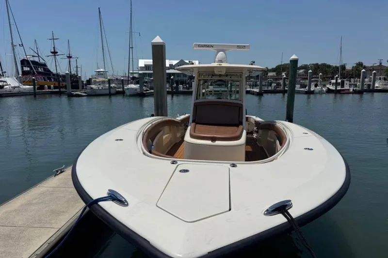  Yacht Photos Pics 2017 Scout 350 LXF boat docked at marina with clear sky background.