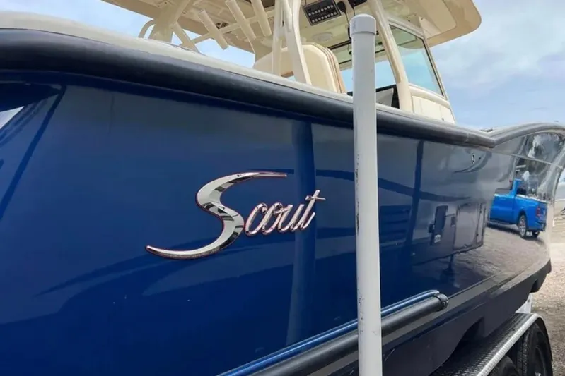  Yacht Photos Pics 2017 Scout 350 LXF boat with blue hull and elegant logo.