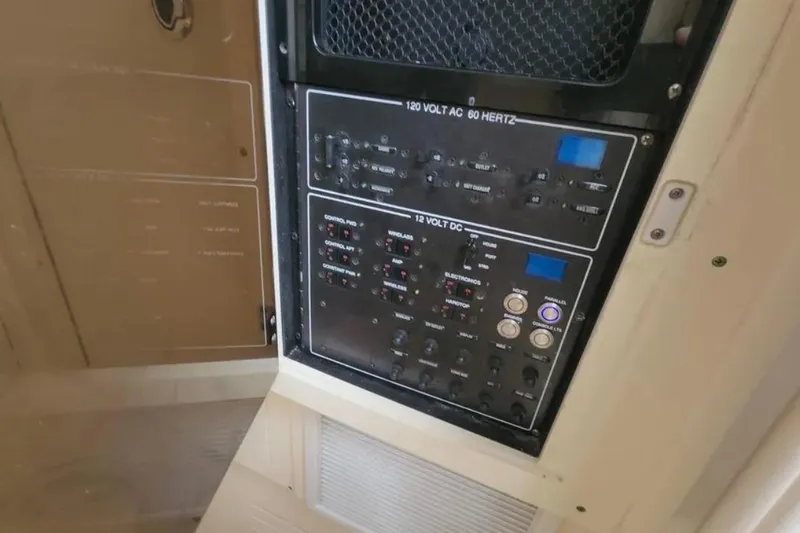  Yacht Photos Pics Electrical control panel on a 2017 Scout 350 LXF boat, featuring 120V AC and 12V DC systems.