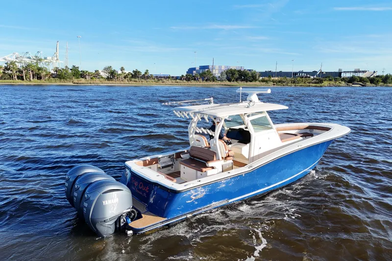  Yacht Photos Pics 2017 Scout 350 LXF boat with Yamaha engines on a sunny day.