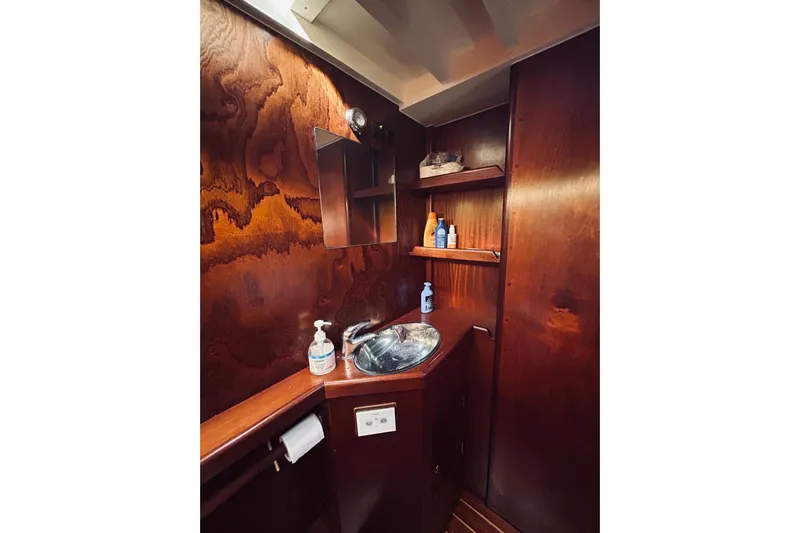 Aria Di Mare Yacht Photos Pics Luxurious wooden bathroom interior on a 2013 Custom Classic Yawl sailboat.