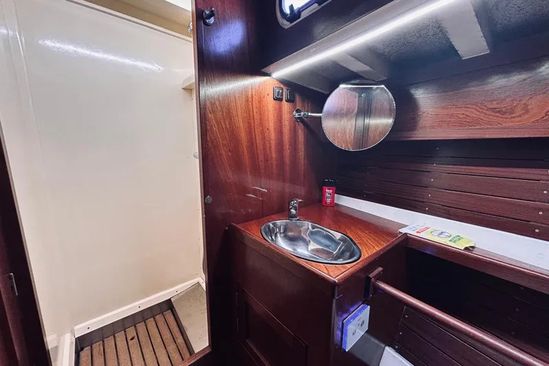 Aria Di Mare Yacht Photos Pics Luxurious 2013 Custom Classic Yawl bathroom with wooden finish and modern fixtures.