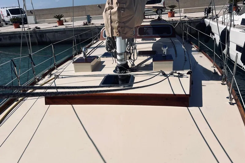 Aria Di Mare Yacht Photos Pics Custom Classic Yawl sailboat deck, 2013 model, docked at marina with clear skies.