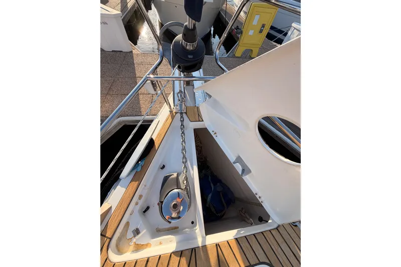 Bella Yacht Photos Pics Anchor locker of 2017 Beneteau Oceanis 45 sailboat with chain and winch.