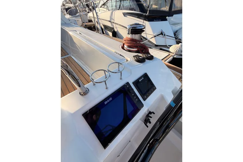 Bella Yacht Photos Pics Cockpit of 2017 Beneteau Oceanis 45 sailboat with navigation instruments and winch.