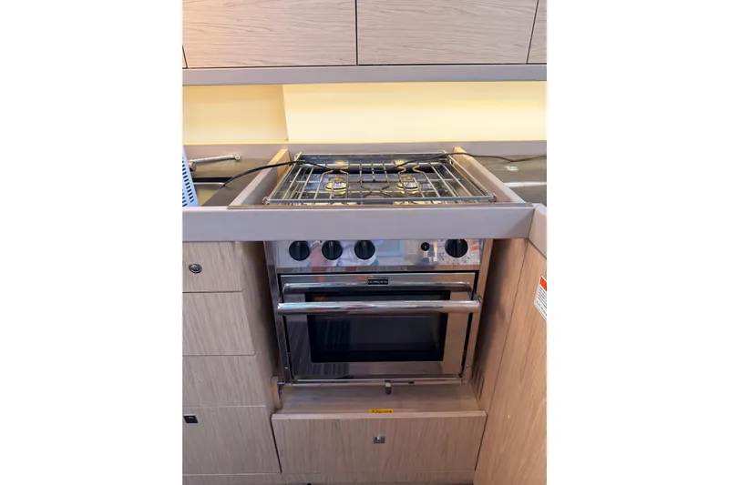 Bella Yacht Photos Pics Modern kitchen stove in 2017 Beneteau Oceanis 45 yacht galley.