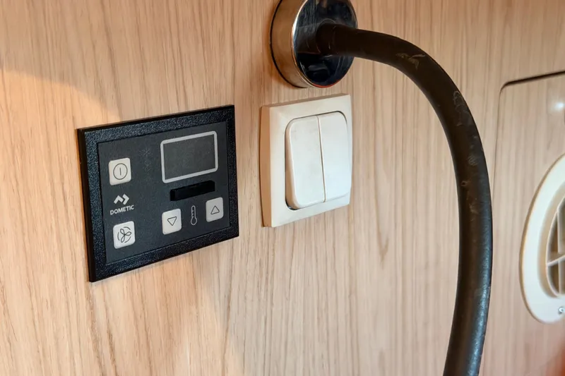 Bella Yacht Photos Pics Control panel and switch on 2017 Beneteau Oceanis 45 yacht interior.
