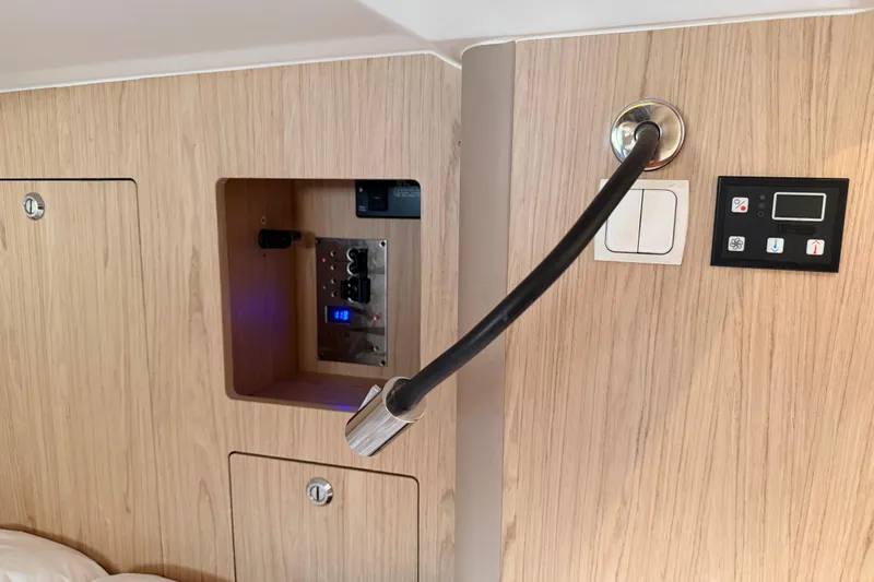 Bella Yacht Photos Pics Control panel and switches on 2017 Beneteau Oceanis 45 yacht interior.