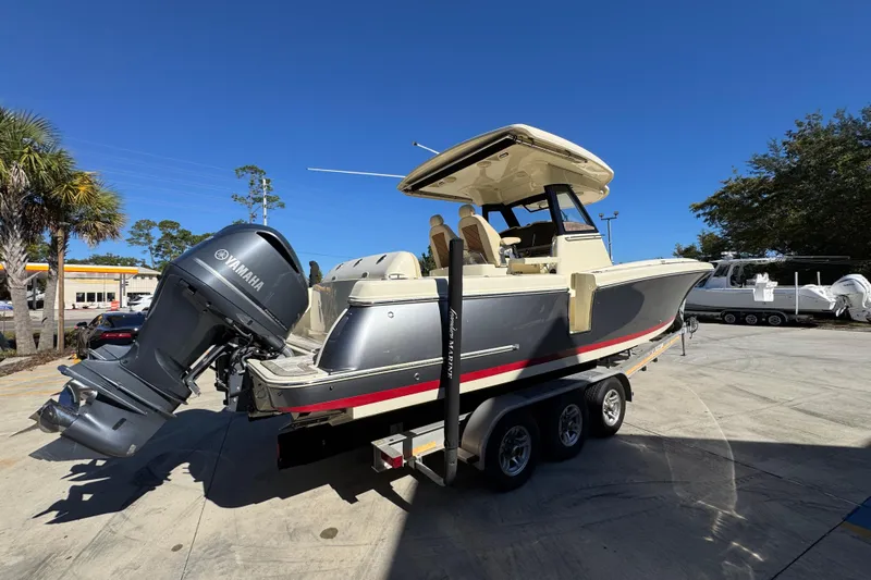  Yacht Photos Pics 2019 Chris-Craft Catalina 30 boat on trailer with Yamaha outboard motor.