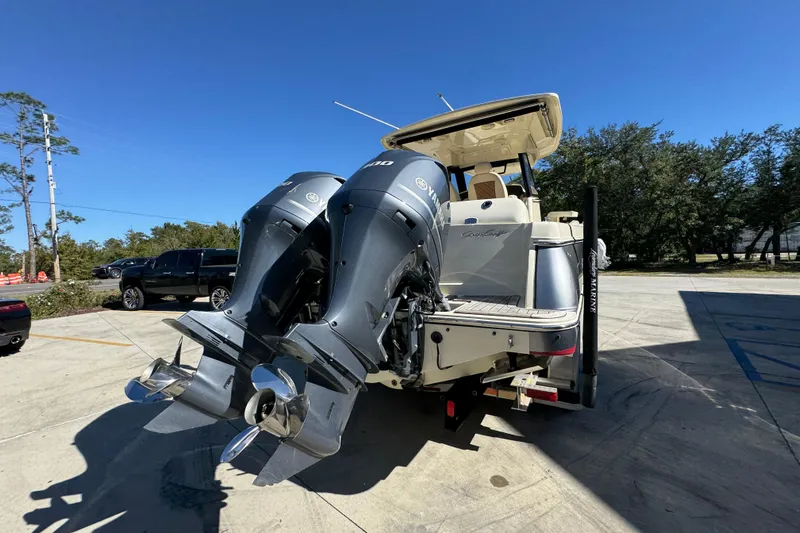  Yacht Photos Pics 2019 Chris-Craft Catalina 30 with dual Yamaha outboard engines, parked outdoors.