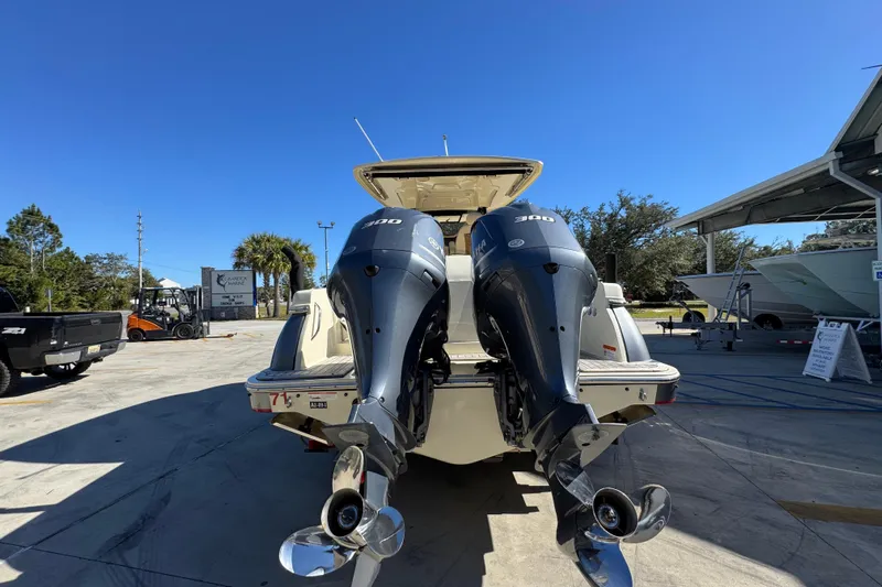  Yacht Photos Pics 2019 Chris-Craft Catalina 30 with dual 300 HP outboard engines, parked outdoors.