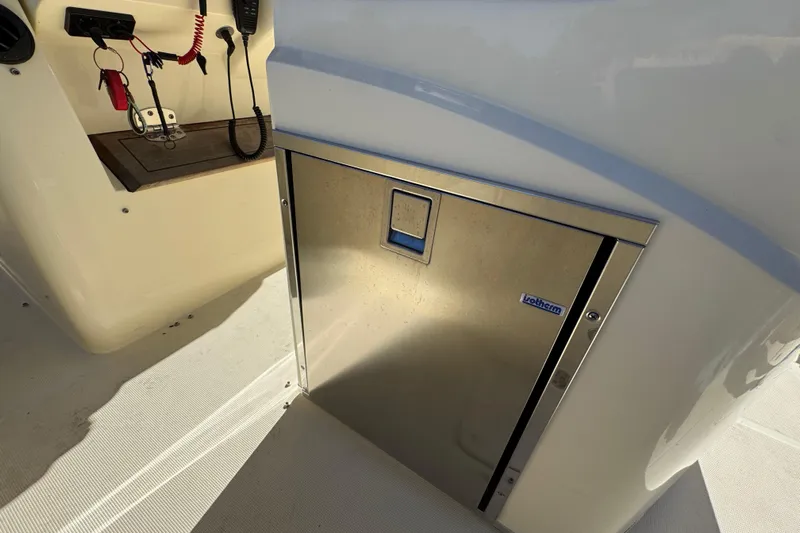  Yacht Photos Pics 2019 Chris-Craft Catalina 30 interior with stainless steel Isotherm fridge.