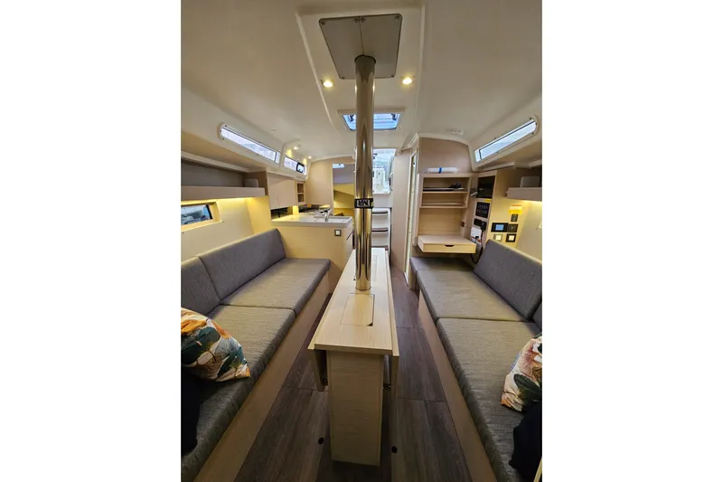 Cutting Edge Yacht Photos Pics Interior of 2023 Beneteau Oceanis 34.1 yacht, featuring modern seating and sleek design.