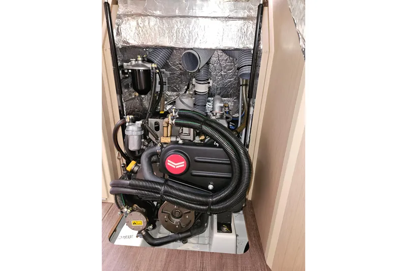 Cutting Edge Yacht Photos Pics 2023 Beneteau Oceanis 34.1 engine compartment with visible components and insulation.