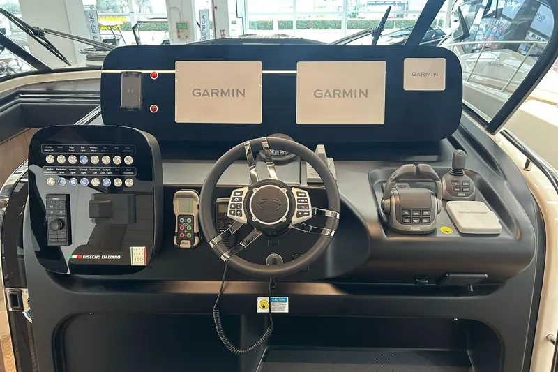  Yacht Photos Pics Cockpit of 2024 Cranchi A46 Luxury Tender with Garmin navigation displays.