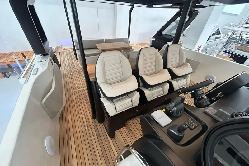  Yacht Photos Pics 2024 Cranchi A46 Luxury Tender interior with sleek seating and modern controls.
