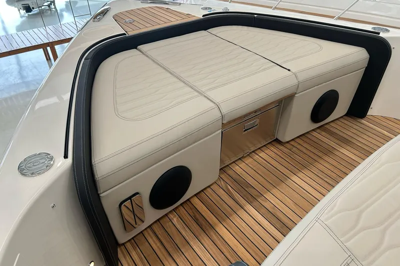  Yacht Photos Pics 2024 Cranchi A46 Luxury Tender interior with elegant seating and teak flooring.