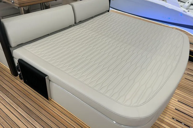  Yacht Photos Pics Luxurious seating area on 2024 Cranchi A46 Luxury Tender with elegant upholstery and teak flooring.