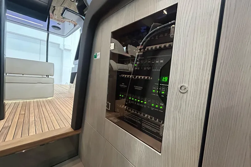  Yacht Photos Pics Electrical panel inside 2024 Cranchi A46 Luxury Tender yacht, showcasing modern design.