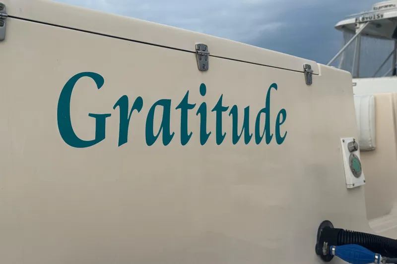  Yacht Photos Pics 2007 Grady-White Marlin 300 boat with "Gratitude" name on the side.