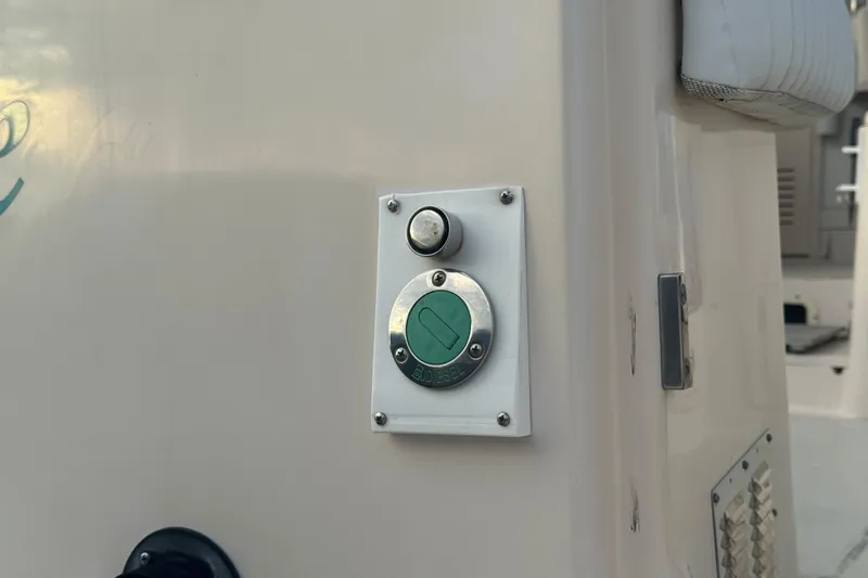  Yacht Photos Pics Fuel cap on 2007 Grady-White Marlin 300 boat, close-up view.