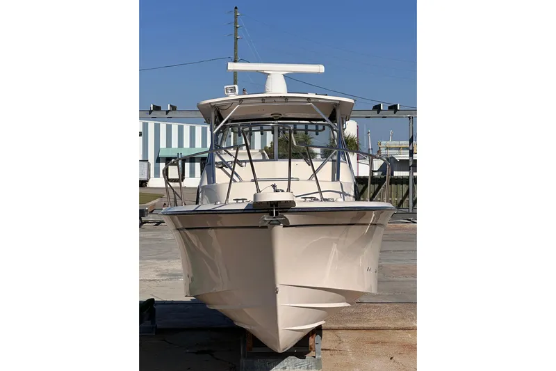 Yacht Photos Pics 2007 Grady-White Marlin 300 boat on dry dock, front view.