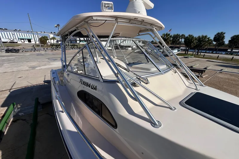  Yacht Photos Pics 2007 Grady-White Marlin 300 boat docked, showcasing sleek design and sturdy construction.