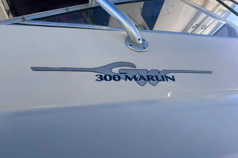  Yacht Photos Pics 2007 Grady-White Marlin 300 boat logo on white surface.