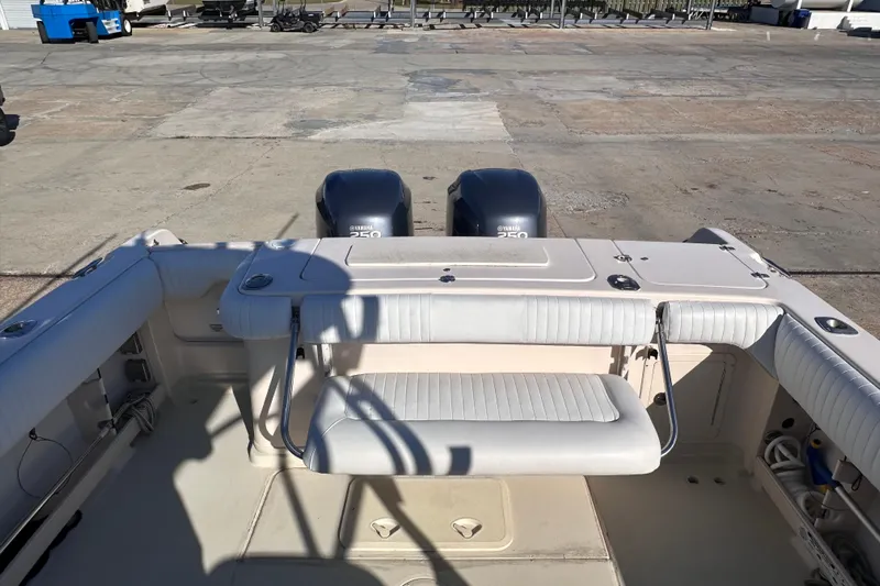  Yacht Photos Pics 2007 Grady-White Marlin 300 boat with Yamaha 250 engines at a marina.