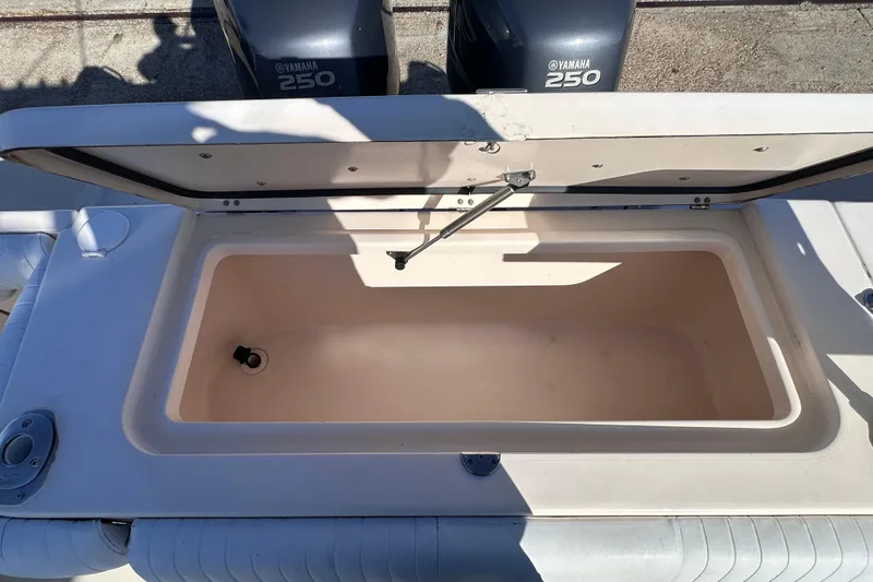  Yacht Photos Pics Open storage compartment on 2007 Grady-White Marlin 300 boat with Yamaha 250 engines.