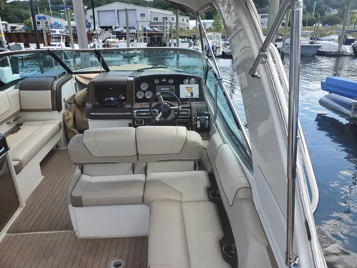 Yacht Photos Pics 2015 Formula 330 Crossover Bowrider interior with luxurious seating and modern dashboard.