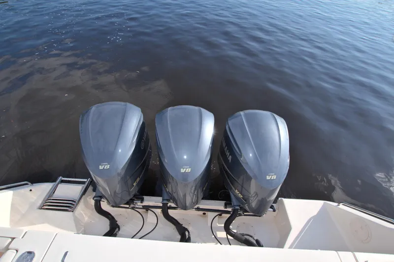Lucky Penny II Yacht Photos Pics 2018 Grady-White Canyon 376 with triple V8 outboard engines on water.