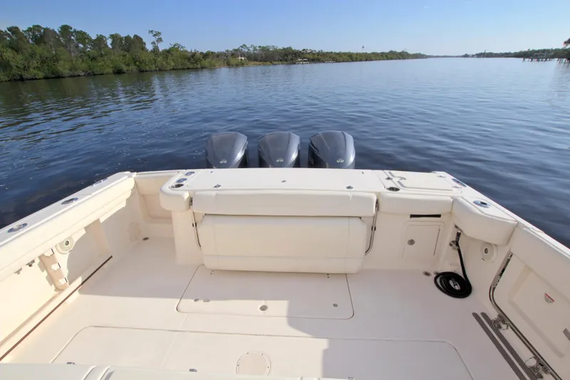 Lucky Penny II Yacht Photos Pics 2018 Grady-White Canyon 376 boat with triple engines on calm water.