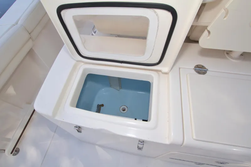 Lucky Penny II Yacht Photos Pics 2018 Grady-White Canyon 376 boat storage compartment with open lid.