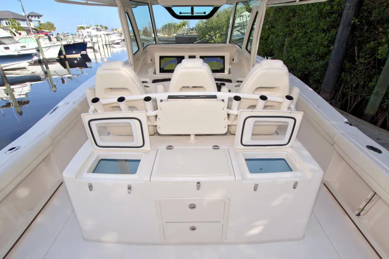 Lucky Penny II Yacht Photos Pics 2018 Grady-White Canyon 376 boat interior with seating and storage compartments.