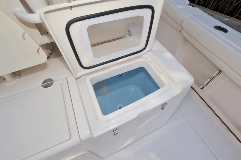 Lucky Penny II Yacht Photos Pics 2018 Grady-White Canyon 376 boat storage compartment with open lid.