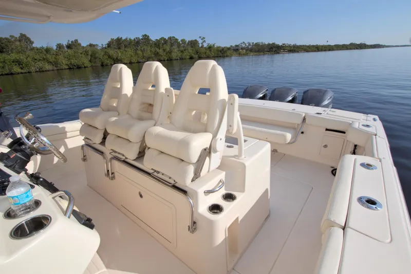 Lucky Penny II Yacht Photos Pics 2018 Grady-White Canyon 376 boat interior with seating and water view.